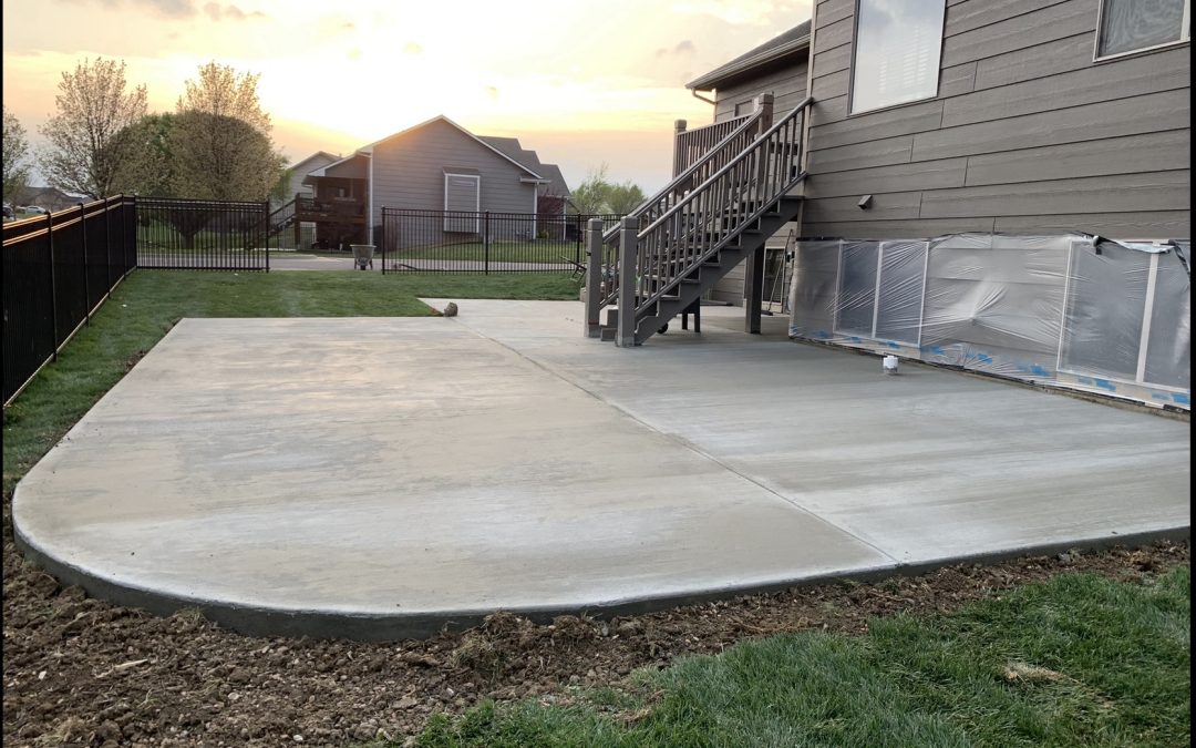 Elevate Your Outdoor Living with Our Custom Concrete Patio Creations